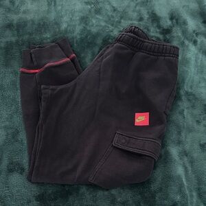 Nike Men’s Navy Cargo Joggers with pink and neon green Accents